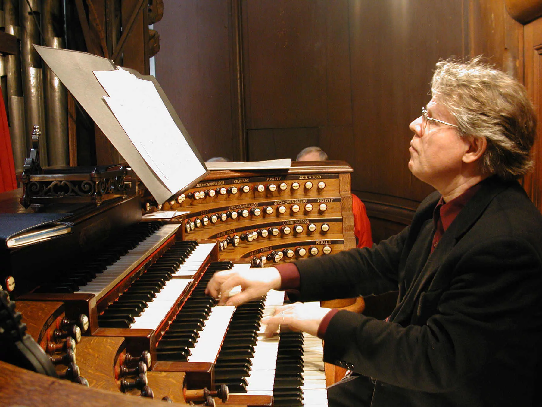 Daniel Roth welcomes guests at the grand pipe organ of St. Sulpice in Paris