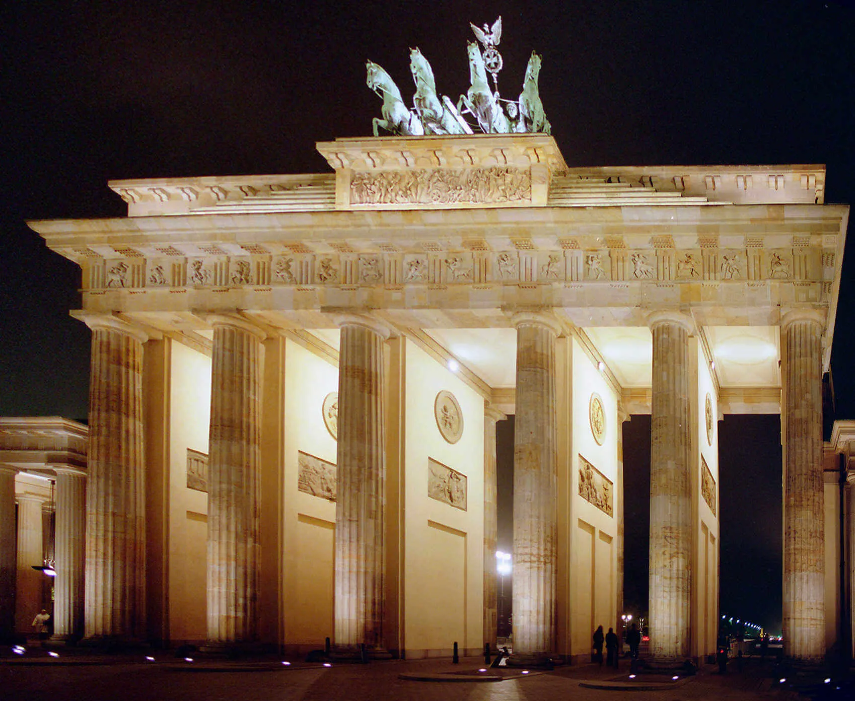 The Brandenburg Gate, which once stood somberly over the no-man's-land of the Berlin Wall, is now a top tourist attraction