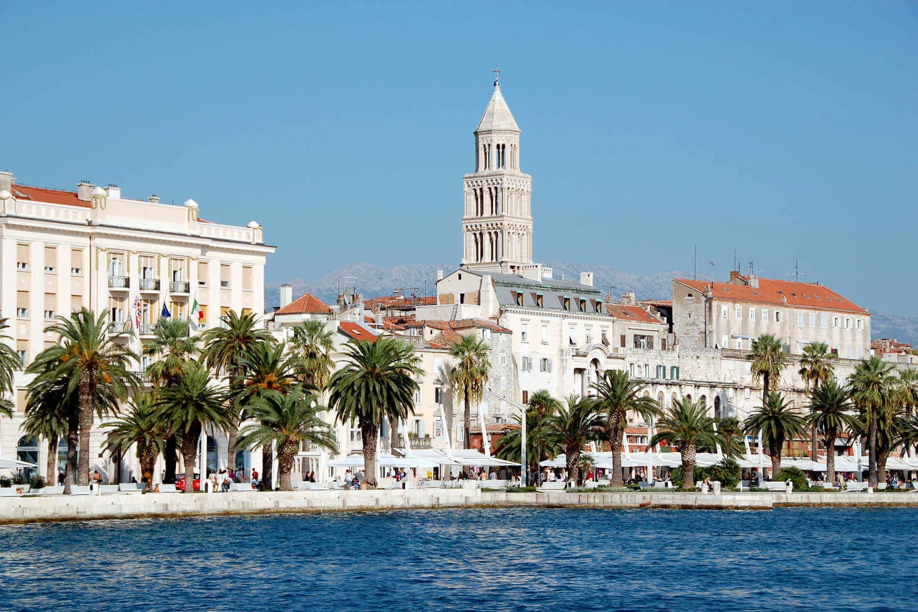 The 200-foot-tall cathedral bell tower rises above Split’s Old Town. Climbing the 183 steep steps to the top rewards you with sweeping views of the city