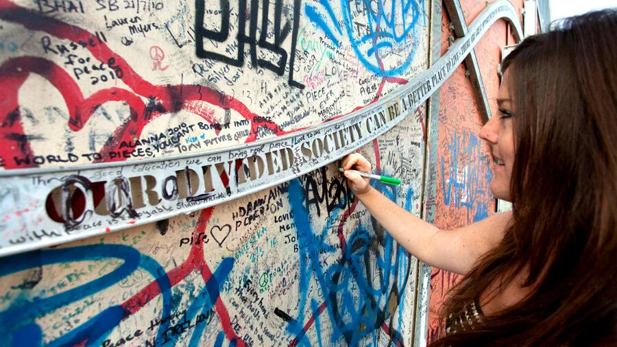 Writing on Belfast’s Peace Wall (Photo by:Dominic Arizona Bonuccelli, Rick Steves’ Europe)