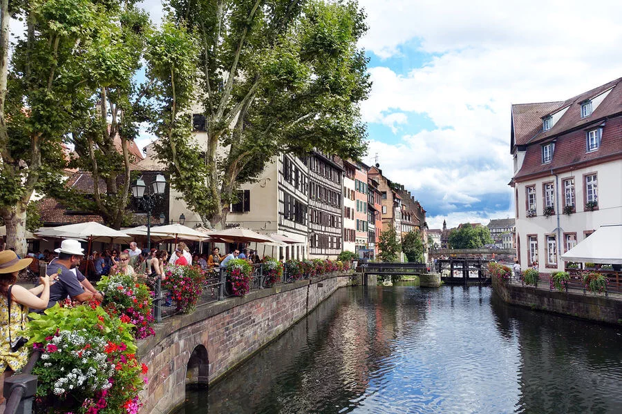 Strasbourg's half-timbered buildings provide a Germanic backdrop for an Alsatian meal on this riverfront terrace