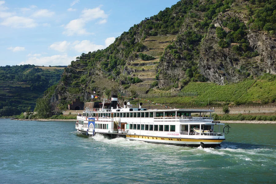 The Rhine River is best experienced from the deck of a relaxing riverboat, surrounded by the wonders of this romantic and historic gorge