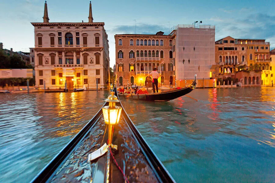 Though expensive, riding a gondola at night is one of the great experiences in Europe