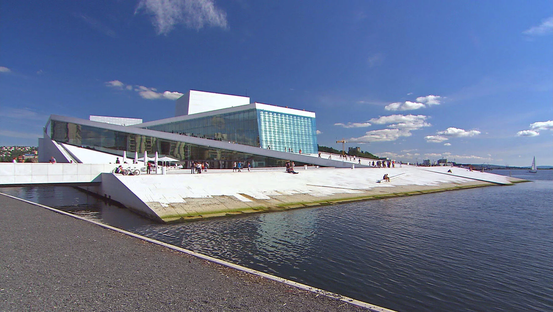 Oslo's Opera House rises from the water on the city’s eastern harbor