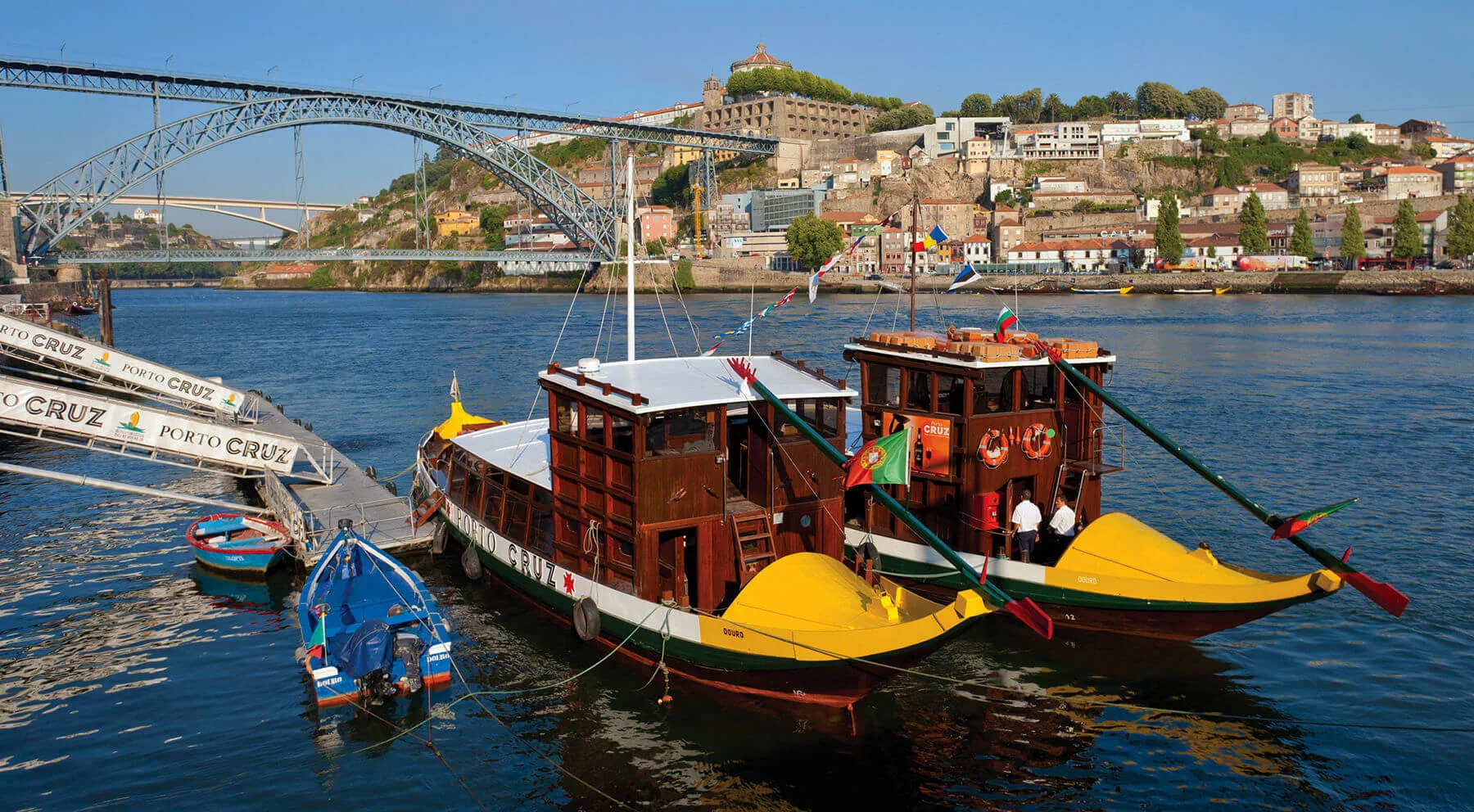 Traditional boats called “rabelos” await passengers on the banks of Douro