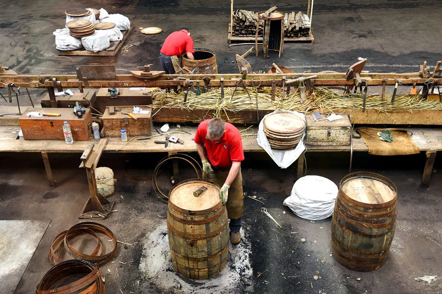 Workers at Scotland's Speyside Cooperage fashion oak casks for aging Scotch whisky