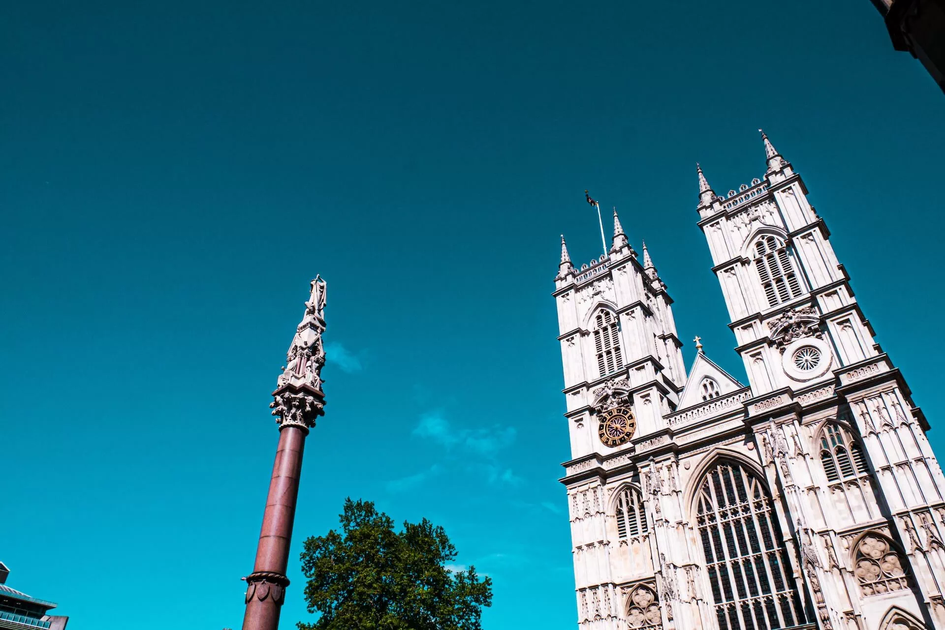   The facade of London’s Westminster Abbey glows in sunshine
